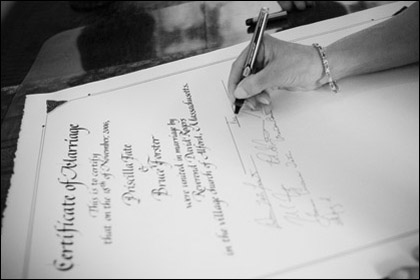 Priscilla Tate signing marriage cert